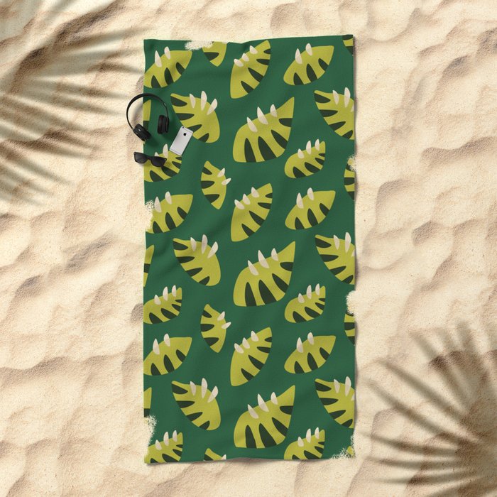beach towel with a green leaf pattern