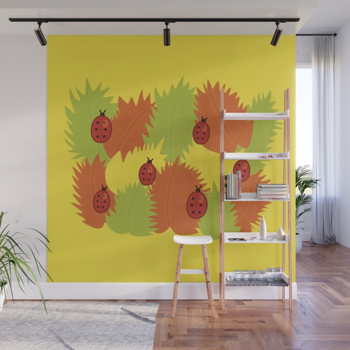 Autumn leaves and ladybugs wall mural at Society6