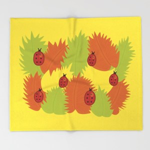 Autumn leaves and ladybugs blanket at Society6