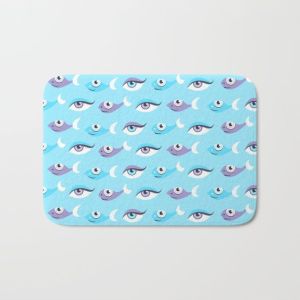 Eyes and fish pattern bathmat at Society6