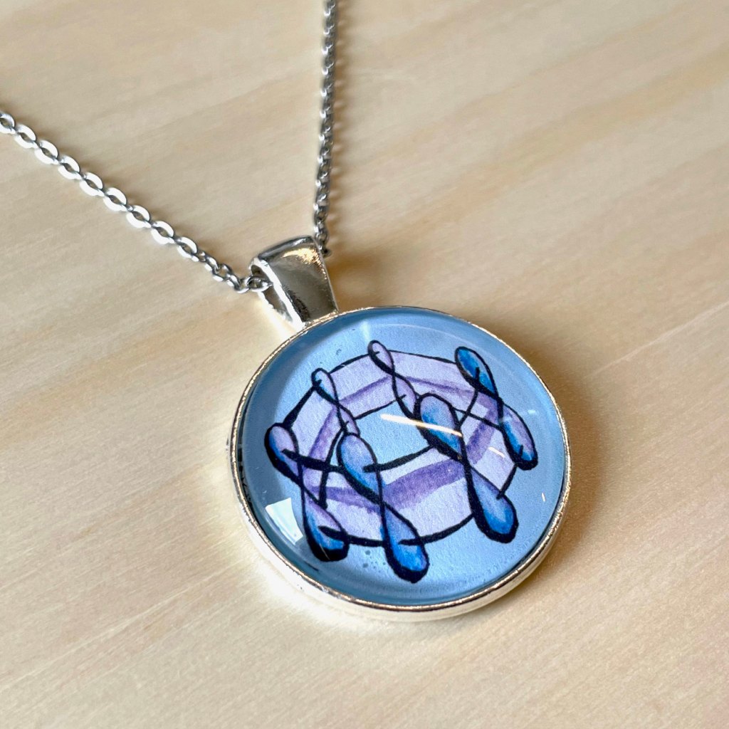 Necklace with benzene molecule art