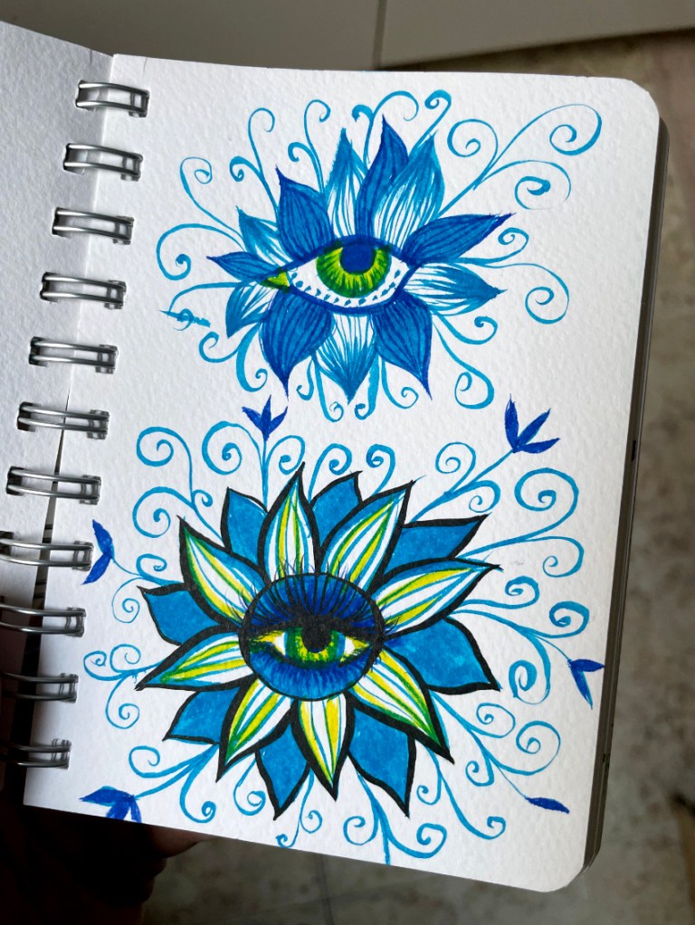 photo of sketches of this trippy artwork