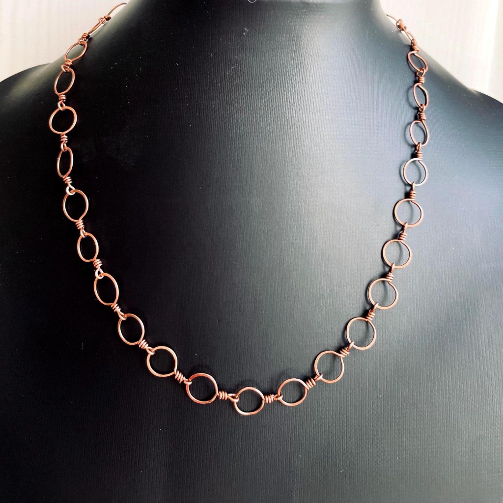 the necklace on a mannequin bust