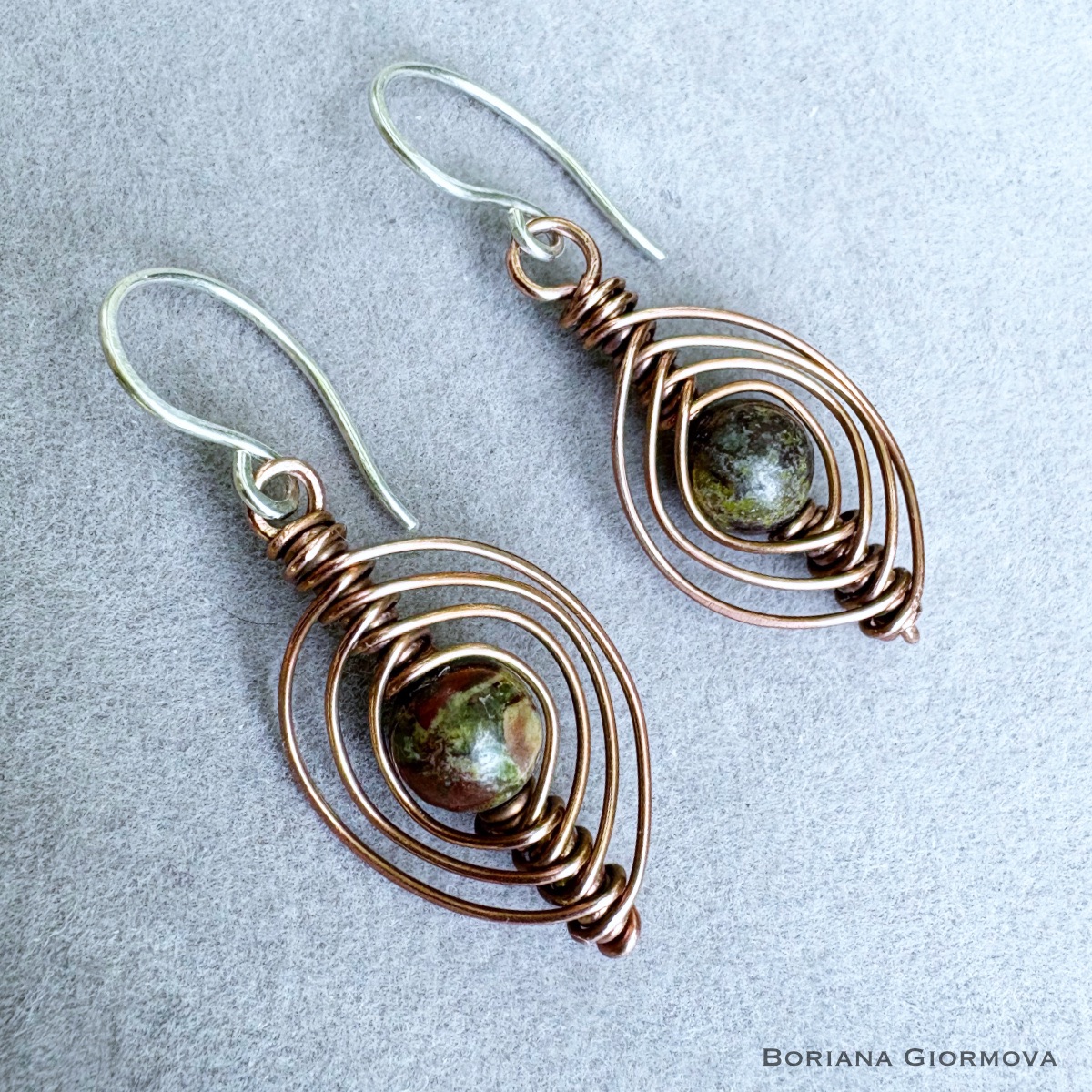 Herringbone style wire wrapped copper earrings with dragon blood jasper stone and sterling silver ear hooks