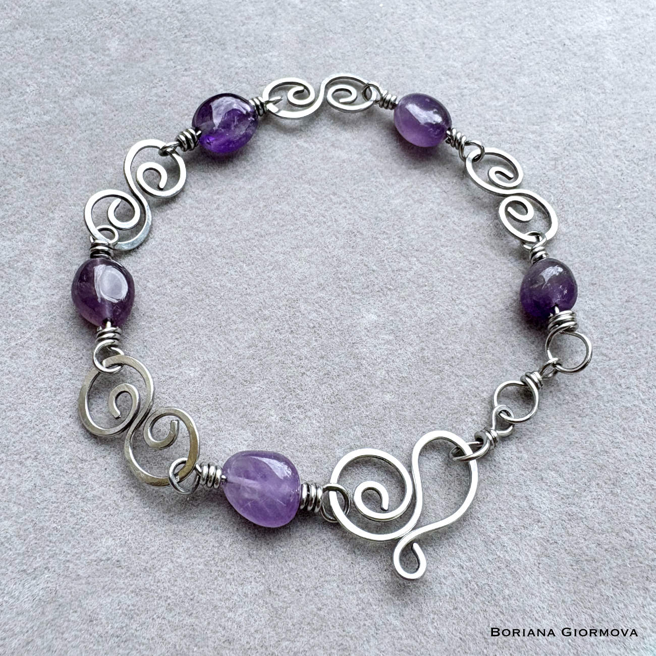 February birthstone bracelet with amethyst and double spiral&nbsp;links