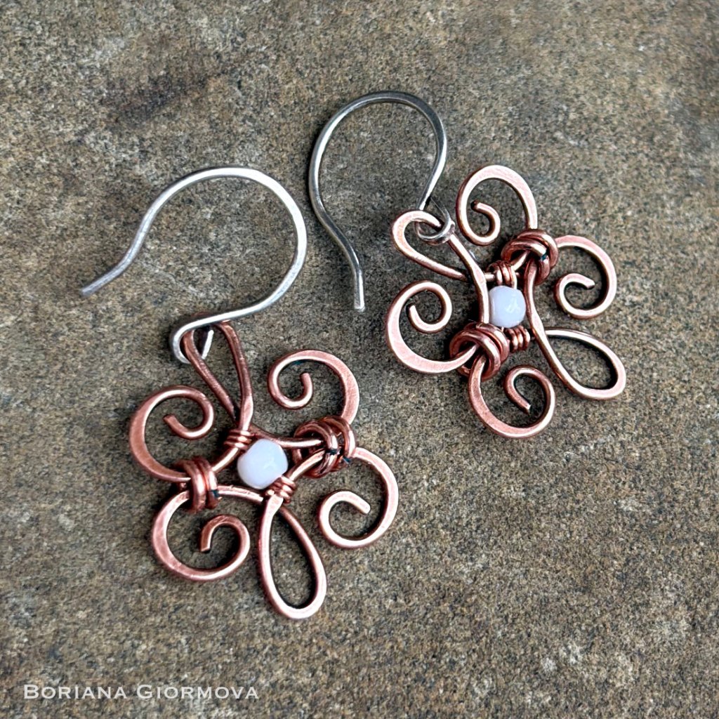 wire wrapped earrings shot on natural stone