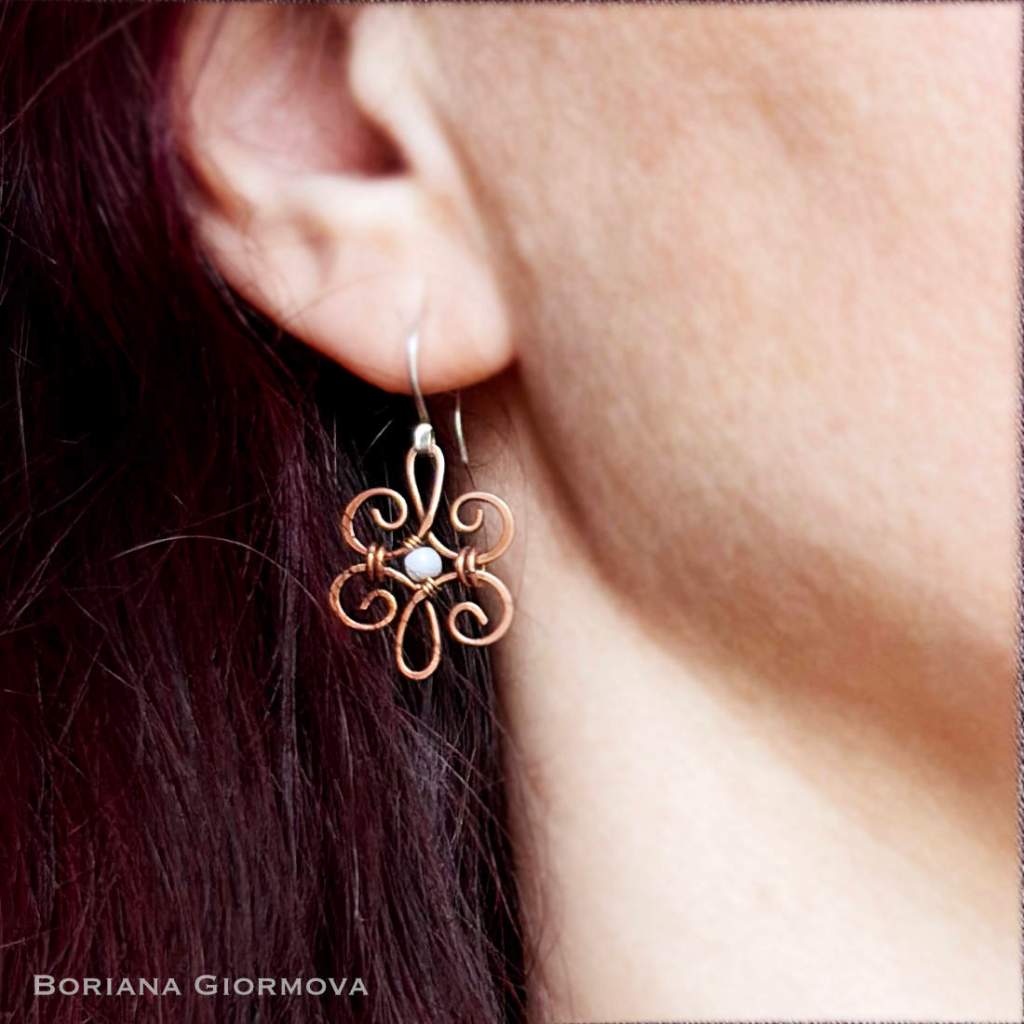 handmade earring on person's ear