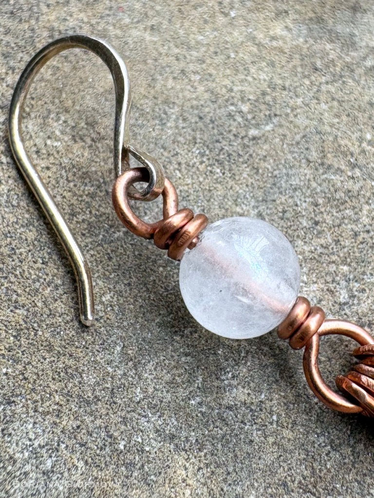 close-up on one of the moonstones where its specific light effect adularescence can be seen